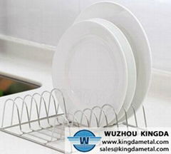 Stainless steel dish drainer in sink