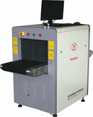 l   age check baggage x-ray machine