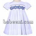 White geometric smocked dress for little