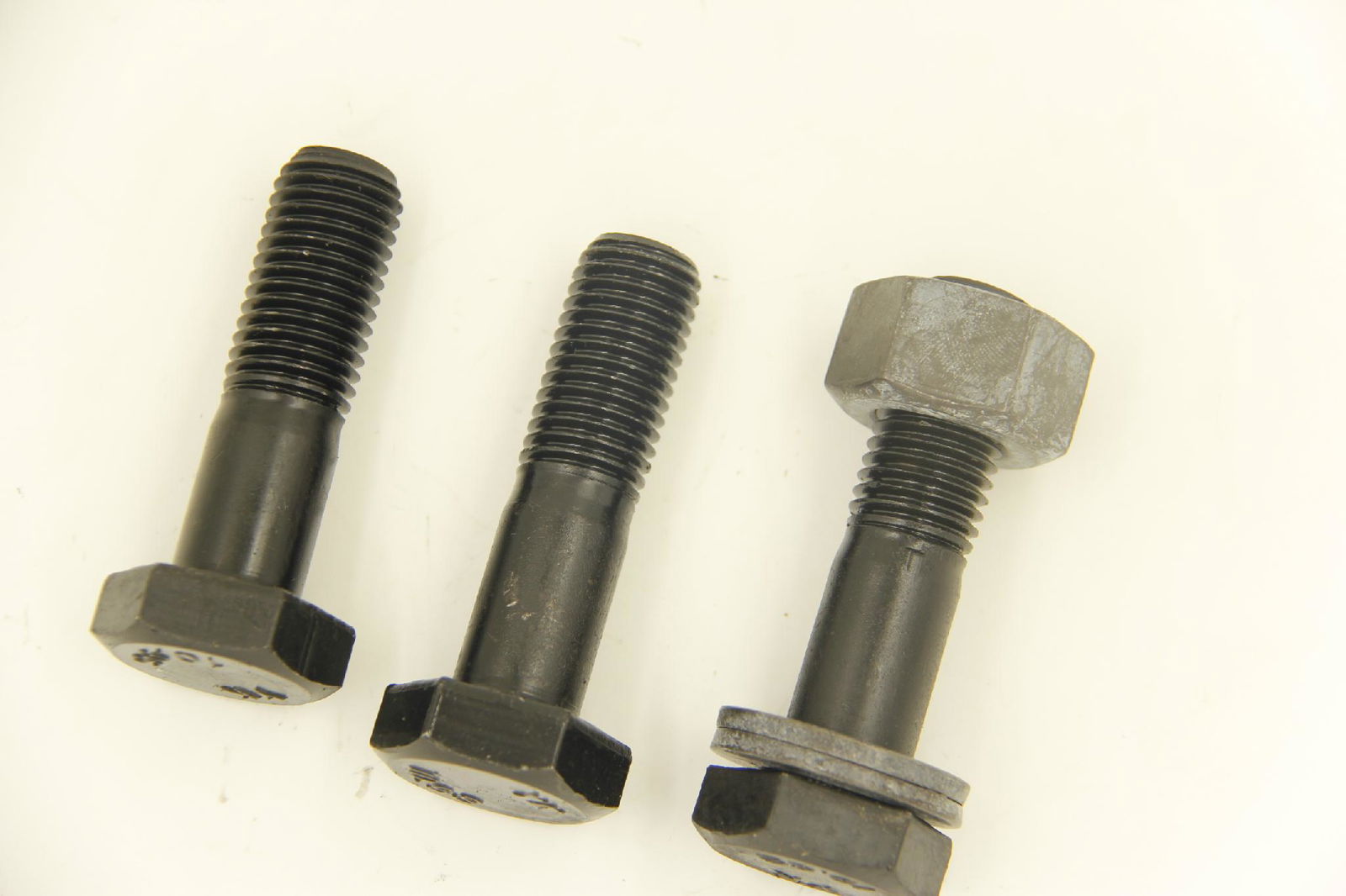 Hexagon head bolt and nut with washer