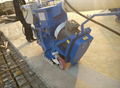 Concrete road wheel abrator with the