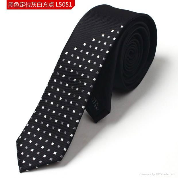 Background black with grey and white blocks polyester woven neck tie ...
