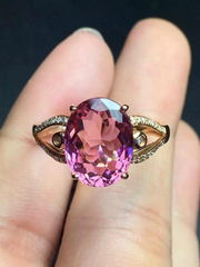 Fashion natural pink tourmalines 18k gold ring set with diamonds.