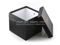 Black cardboard box with gold stamped