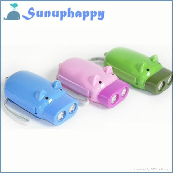 Wholesale custom cartoon plastic green pig shape flashlight