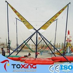 Four people bungee jumping amusement ride