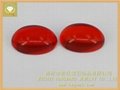 Cabochon oval shape red colour glass