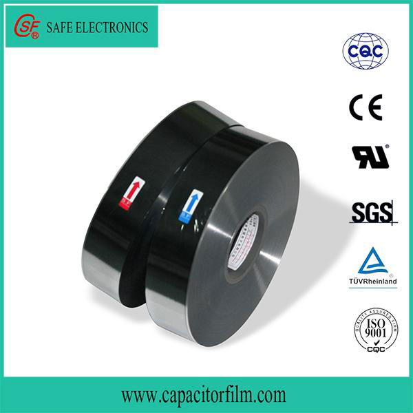 Double-sided and central margin metallized PET film for capacitor used