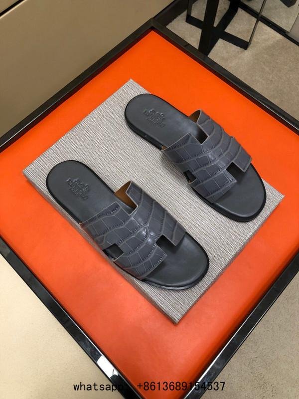        slides        slippers        oran sandal black leather H slides sandals
