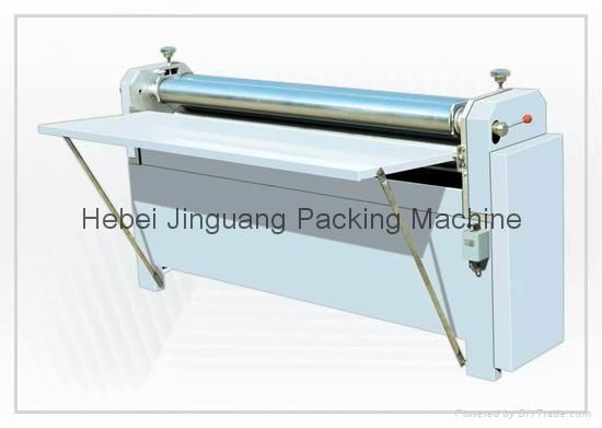 Corrugated paperboard gluing machine