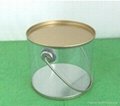 Clear plastic cylinder with tin lid