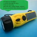 Multifunction emergency solar torch hand operated FM radio mobile charging  3