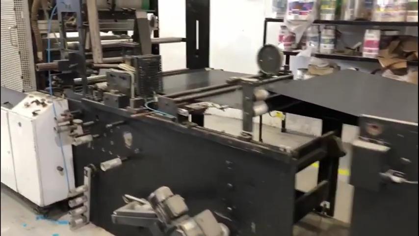 Garbage bag making machine with draw tape 2