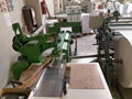 Slitter and rewinder for ATM paper rolls 3