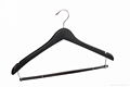 Natural wooden coat hanger with locking bar