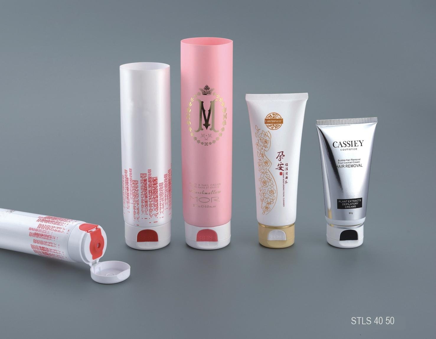 Body lotion cosmetic tubes with double color caps