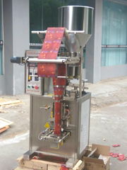 Particle vacuum packaging machine