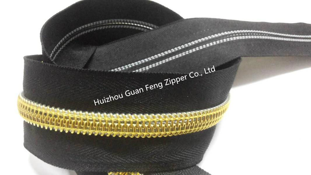 10# man pattern nylon zipper with black tape and golden teeth 5