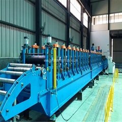 Roll forming machine for roof profile