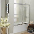 Sliding skirted bathtub shower doors