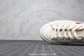 COMME DES GARCONS PLAY Chuck Taylor x CONVERSE White / Black 9