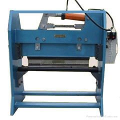 Longitudinal seam cutting machine