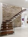 Contemporary wood staircase with glass railing 2