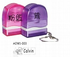 Keychain with self inking stamp