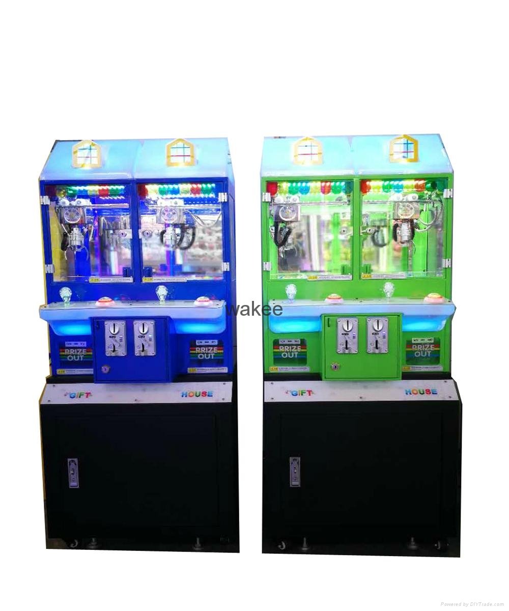 2017 candy slot machine arcade game Magic House doll coin pusher machine for kid 1