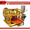 Mobile egg laying block machine for making concrete hollow blocks