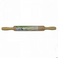 Wooden rolling pin with rotatable handle