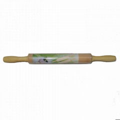 Wooden rolling pin with rotatable handle