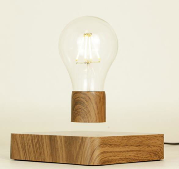 Bottom magnetic rotating and levitating floating lighting bulb for table desk la