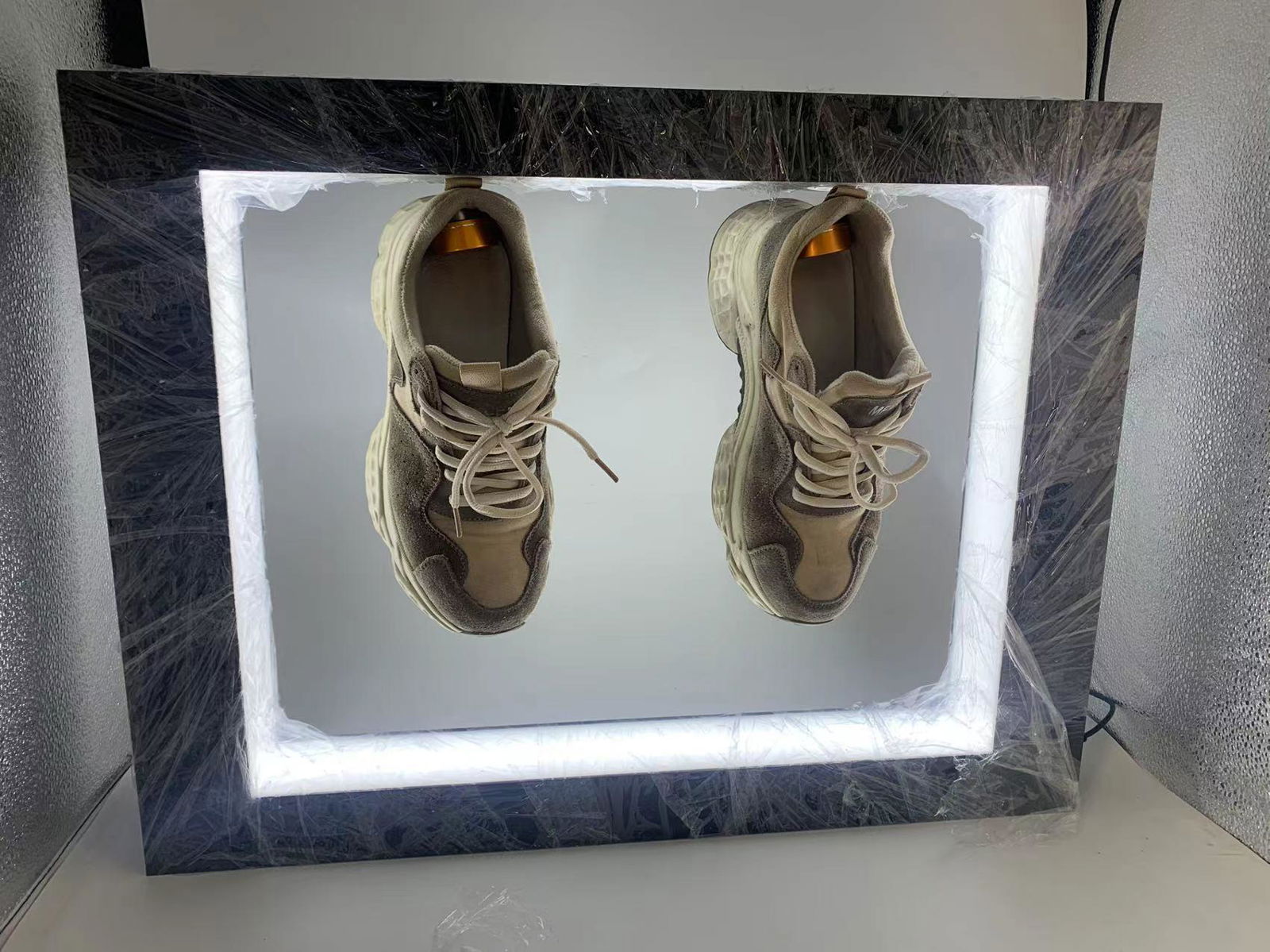 customize logo magnetic levitation rotating shoe advertisment display rack  4