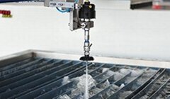 Abrasive waterjet cutting machine for
