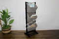 Magazine basket tower with wooden frame,