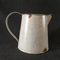 metal watering can