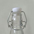 Hot selling 500ml clear glass bottle with flip top