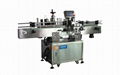 DX212Automatic positioning round bottle labeling machine 1