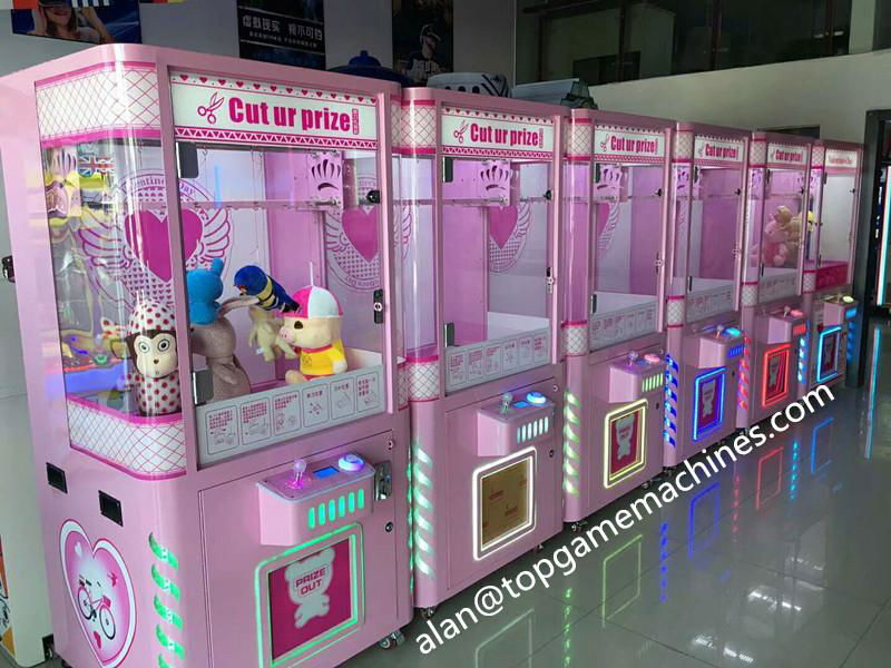 coin operated games crane claw gift machine for sale 3