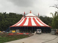 The circus performs in circular tents