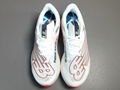 White and red New Balance FuelCell Racer EiteV2 Series ultra-lightweight low-top