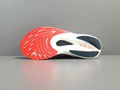 White and red New Balance FuelCell Racer EiteV2 Series ultra-lightweight low-top