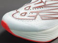 White and red New Balance FuelCell Racer EiteV2 Series ultra-lightweight low-top