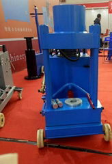 Vertical shaft disassembly machine