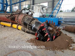 Hydraulic cutter sand suction pump dredger with cutter head.