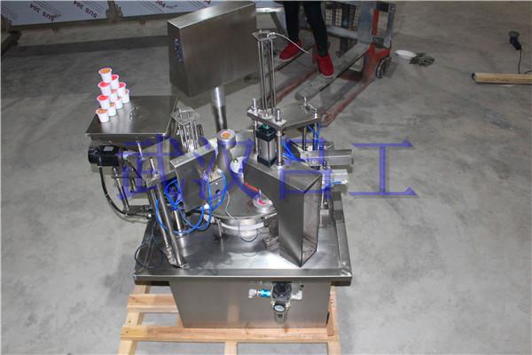 Automatic filling and sealing machine for cupped coffee powder 3