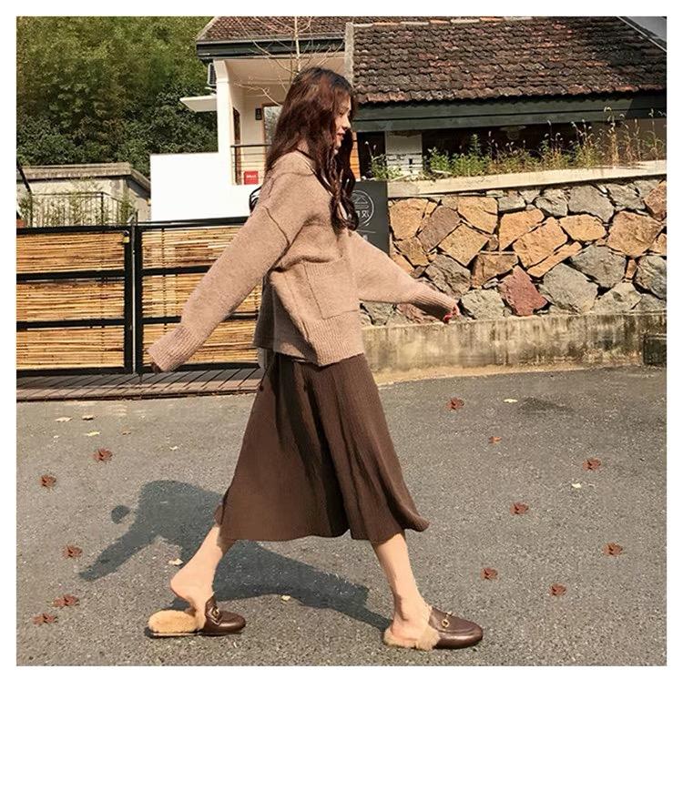 The new women's sweater skirt in autumn and winter features a long high waist an