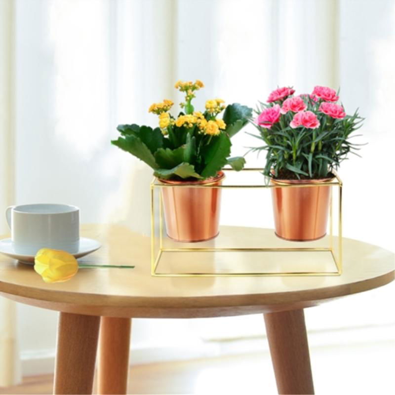 metal flower stand with gold pot