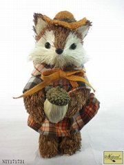 Brown grass fox with acorn in hand
